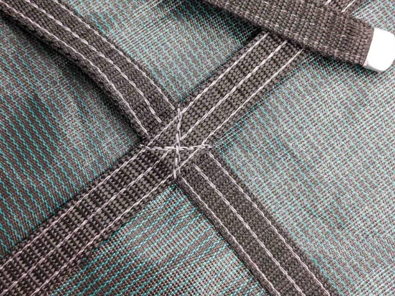 A picture of a pool safety cover stitching